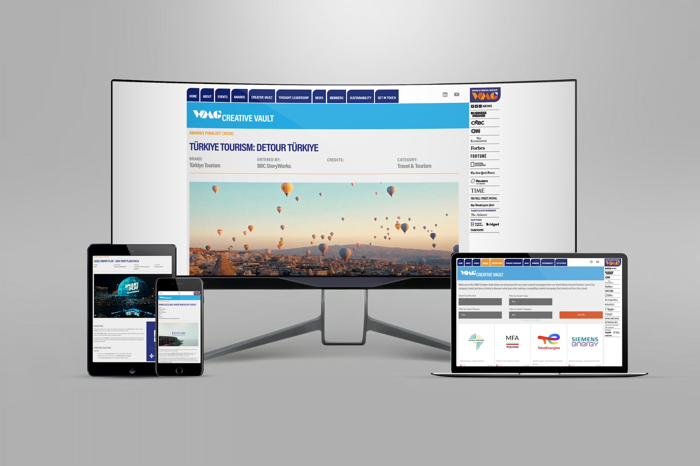 WMG Creative Vault shown across desktop, laptop, tablet and mobile